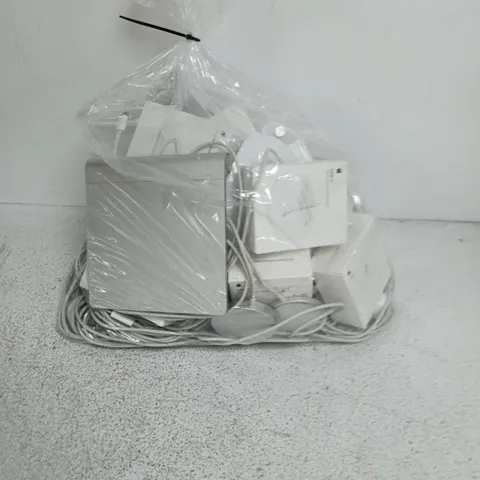 A BAG CONTAINING A LARGE AMOUNT OF APPLE PRODUCTS INCLUDING, PLUGS,WIRES, APPLE TV BOX ETC.