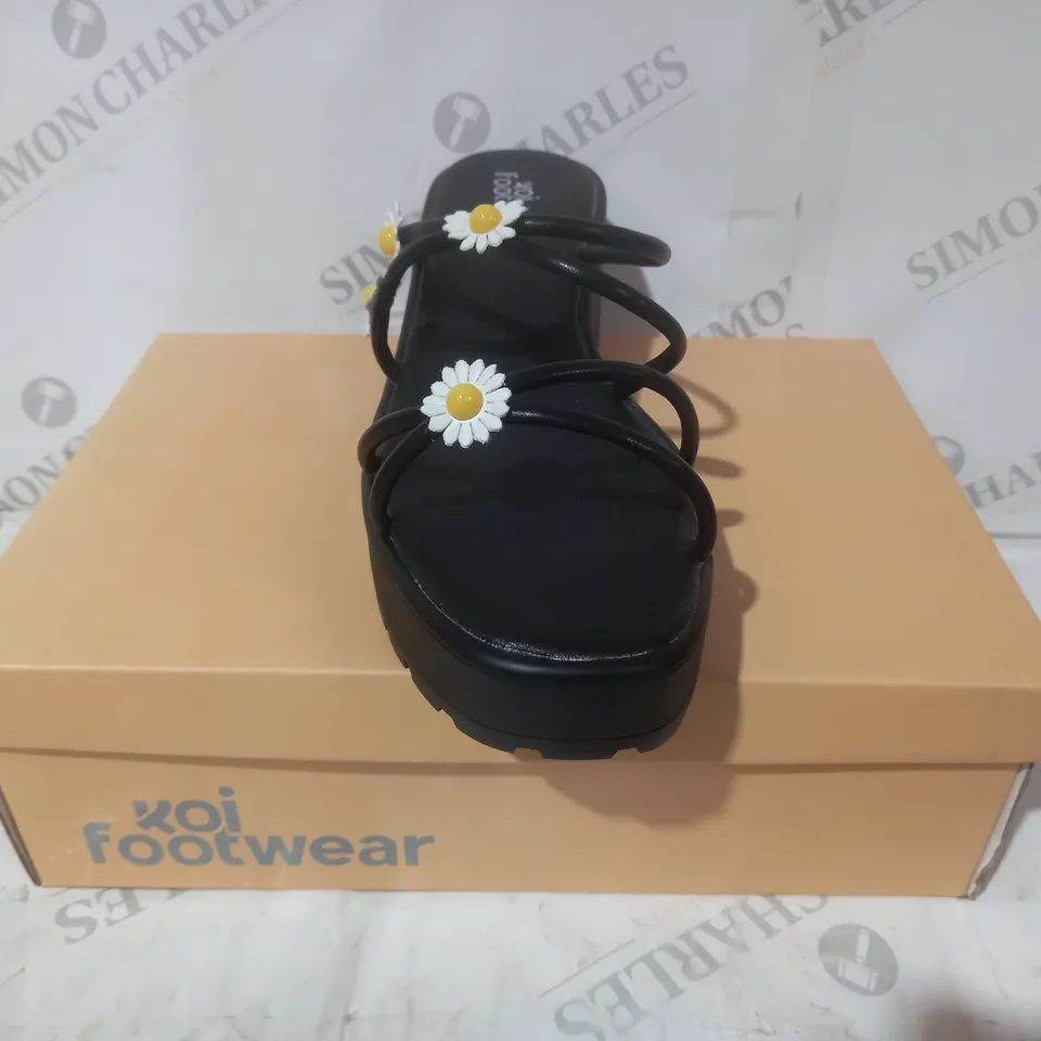BRAND NEW BOXED PAIR OF KOI VEGAN LEATHER BLOOMING DAISY OASIS STRAPPY SLIDERS IN BLACK UK SIZE 10