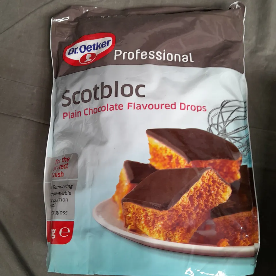 LOT OF CHOCOLATE ITEMS INCLUDE 4KG OF WHITE CHOCOLATE SWIRLS AND DR OTEKER 3KG PLAIN CHOCLATE