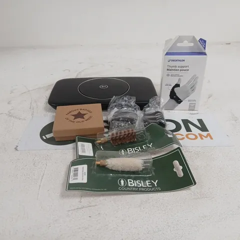 TOTE OF APPROXIMATELY 15 ASSORTED ITEMS TO INCLUDE PAD LOCKS, DECATHLON THUMB SUPPORT, BT ROUTER, BISLEY COUNTRY PRODUCTS, FANCY DRESS DEPUTY MARSHALL BADGE ETC