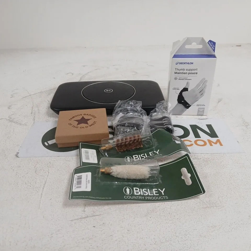 TOTE OF APPROXIMATELY 15 ASSORTED ITEMS TO INCLUDE PAD LOCKS, DECATHLON THUMB SUPPORT, BT ROUTER, BISLEY COUNTRY PRODUCTS, FANCY DRESS DEPUTY MARSHALL BADGE ETC