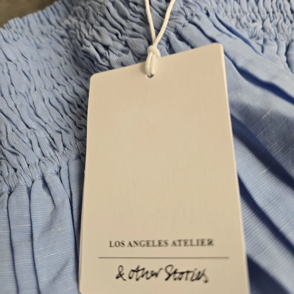 LOS ANGELES ATELIER WOMEN'S LIGHT BLUE SMOCKED SKIRT – EUR M