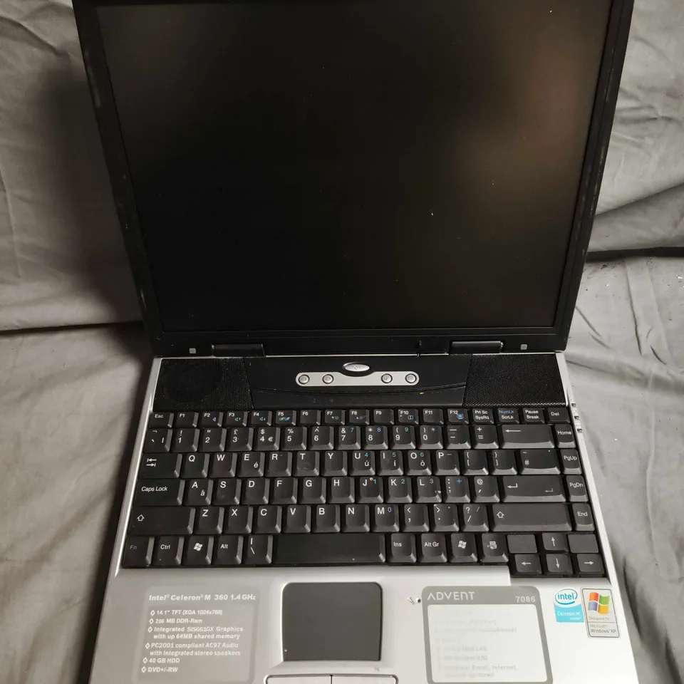 ADVENT 7086 LAPTOP – 14.1IN TFT, CELERON M 1.4GHZ, 256MB RAM, 40GB HDD, WINDOWS XP HOME