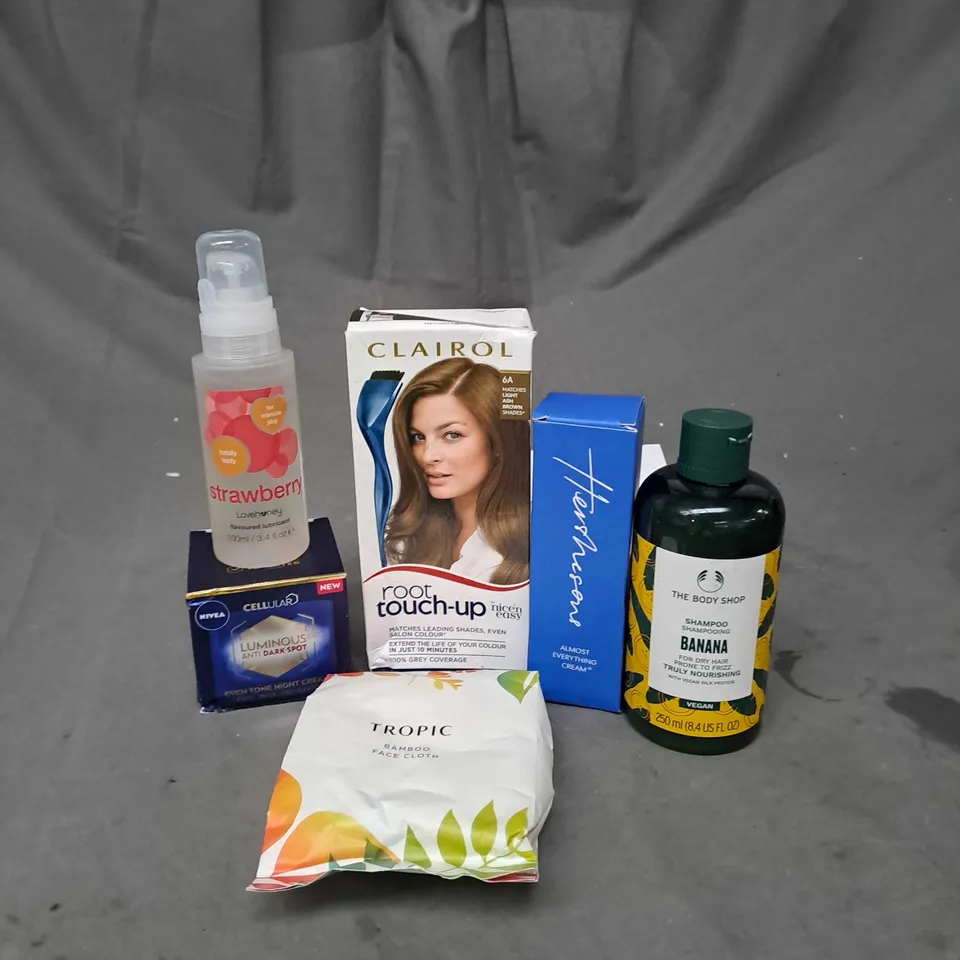 APPROXIMATELY 20 ASSORTED COSMETIC PRODUCTS TO INCLUDE CLAIROL ROOT TOUCH UP, TROPIC FACE CLOTH AND NIVEA DARK SPOT CREAM