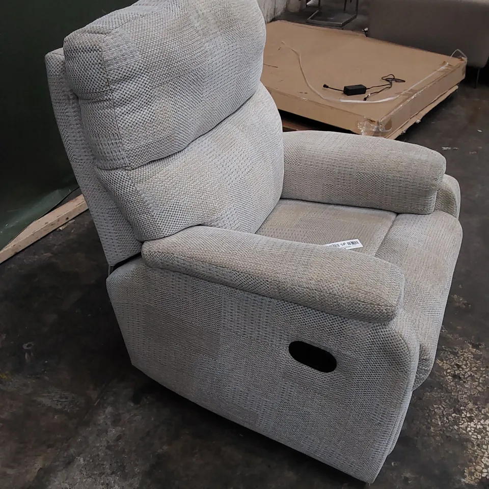 DESIGNER MANUAL RECLINER ARMCHAIR UPHOLSTERED IN BEIGE FABRIC