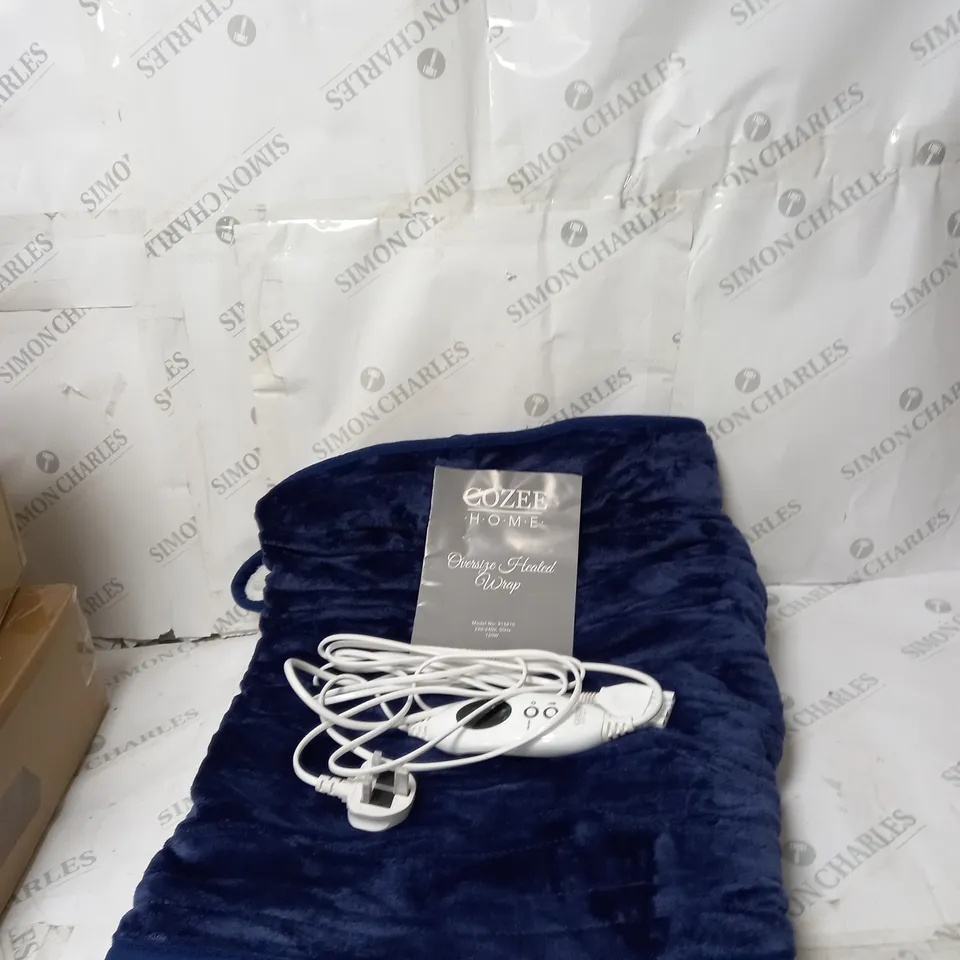 BOXED COZEE HOME VELVETSOFT & SHERPA HEATED WRAP IN NAVY
