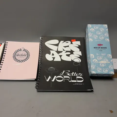 BOX OF APPROXIMATELY 15 ASSORTED ITEMS TO INCLUDE - TYPO CERAMIC CARD HOLDER - BOX OF SOCKS - SPEAK UP CASE ECT