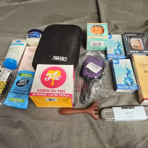 APPROXIMATELY 12 ASSORTED HEALTH & BEAUTY PRODUCTS TO INCLUDE VASELINE, WAHL SHAVER, AND SCALP MASSAGER ETC.