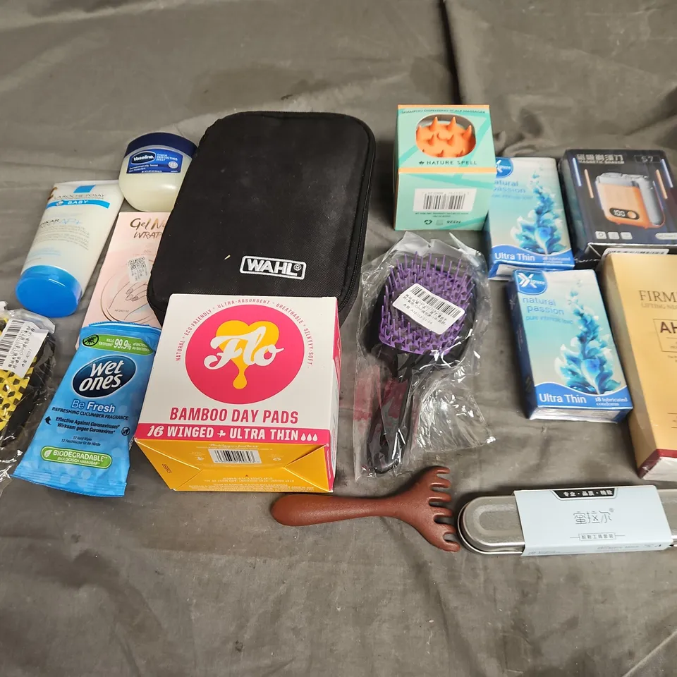 APPROXIMATELY 12 ASSORTED HEALTH & BEAUTY PRODUCTS TO INCLUDE VASELINE, WAHL SHAVER, AND SCALP MASSAGER ETC.