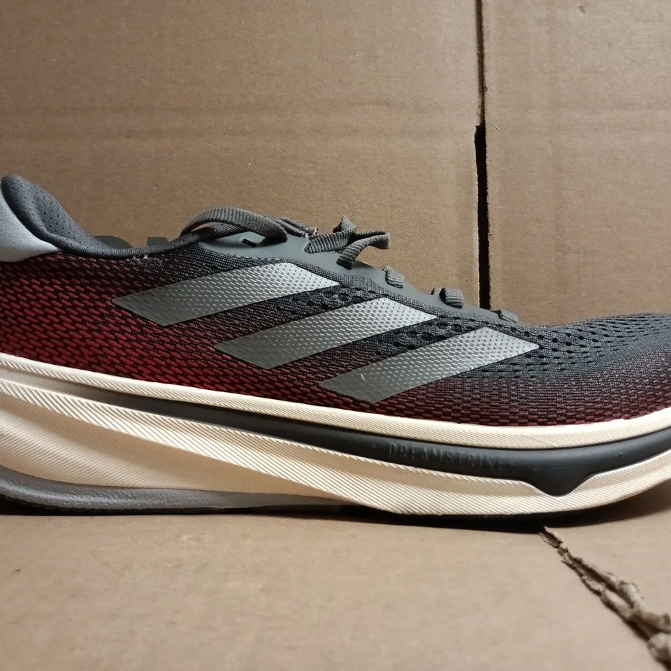 PAIR OF ADIDAS SUPERNOVA TRAINERS IN GREY/RED SIZE UK 10
