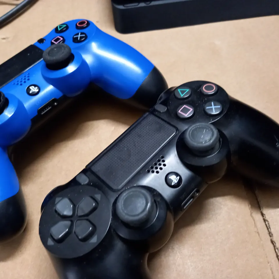 UNBOXED PLAYSTATION 4 CONSOLE WITH 2 CONTROLLERS