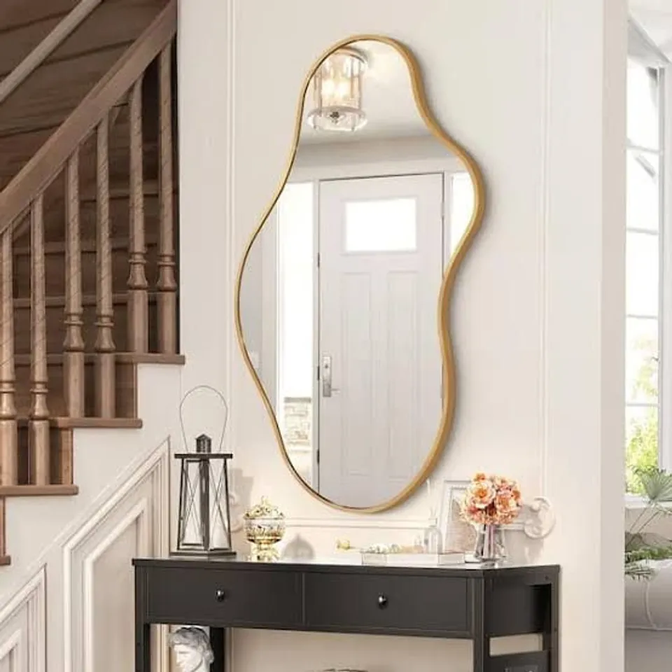 BOXED 24 IN. W X 43 IN. H IRREGULAR GOLD ALUMINUM ALLOY FRAMED ASYMMETRICAL WALL MIRROR