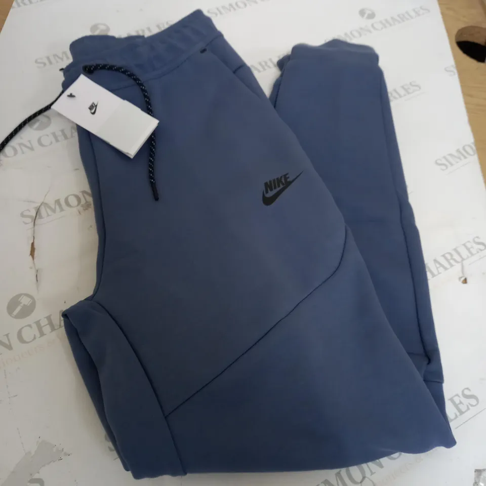 NIKE LIGHT BLUE TECH FLEECE JOGGERS SIZE L 