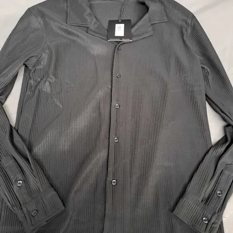 THE ICON AMSTERDAM X ROSS CAMPBELL PLEATED SHIRT IN BLACK - LARGE