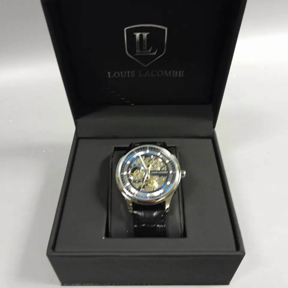 LOUIS LACOMBE BLUE SKELETON DIAL WATCH WITH STAINLESS STEEL CASE AND BLACK LEATHER STRAP IN GIFT BOX