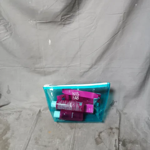NIP+FAB SKINCARE SET IN TURQUOISE ZIP POUCH