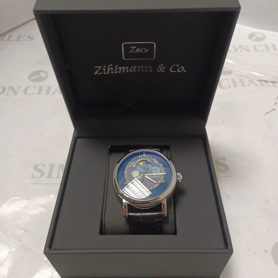 MENS ZIHLMANN & CO AUTOMATIC WATCH – Z150 – MOONPHASE DIAL – GLASS EXHIBITION BACKCASE - SILVER COLOUR CASE – BLACK LEATHER STRAP