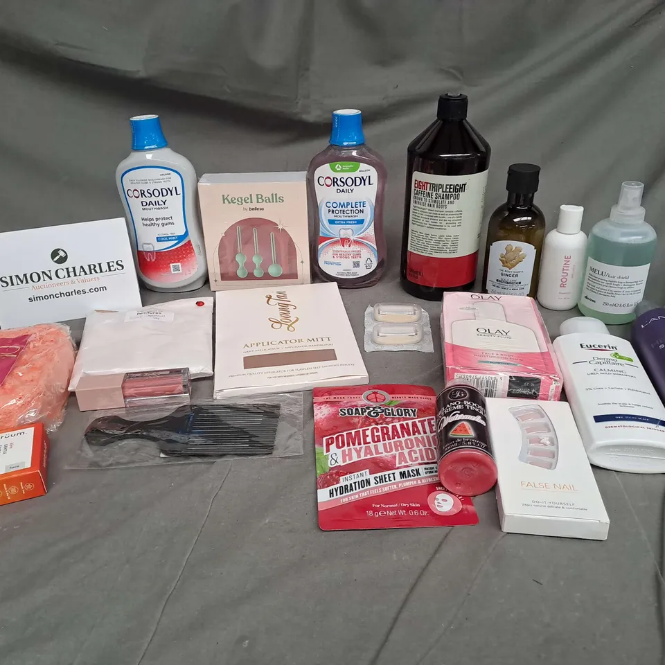 APPROXIMATELY 20 ASSORTED COSMETIC PRODUCTS TO INCLUDE OLAY BEAUTY FLUID, LOVING TAN MIT, AND KEGEL BALLS BELLESA ETC. 
