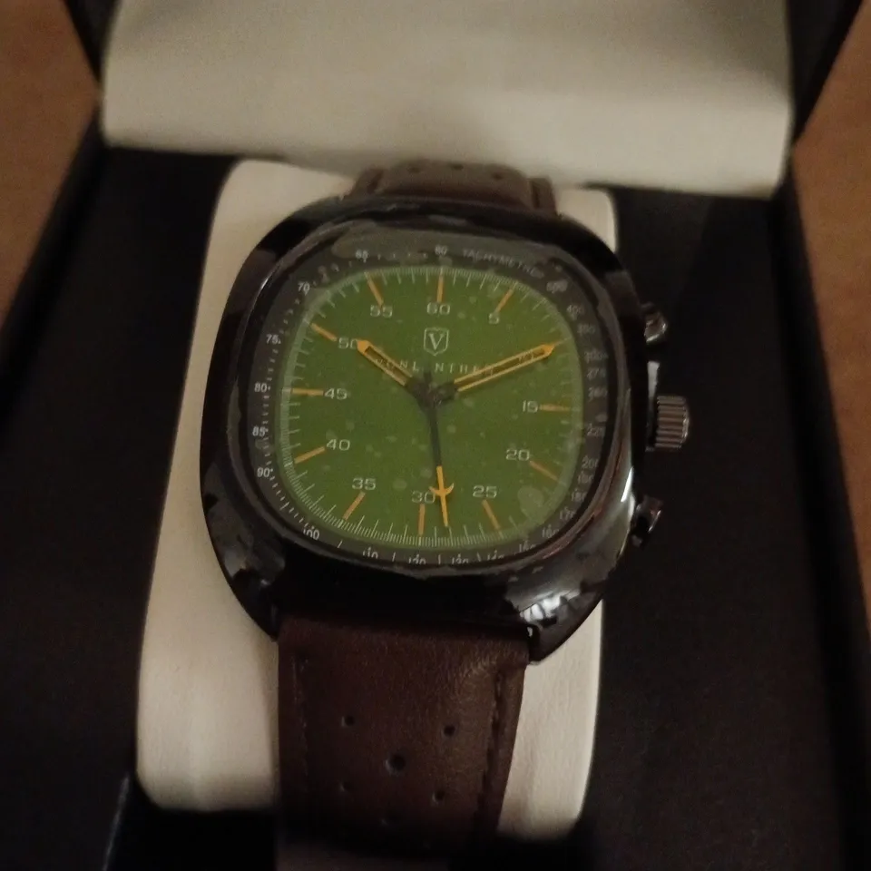 VONLANTHEN AVIATION WATCH FEATURING A GREEN DIAL AND A BROWN PERFORATED LEATHER STRAP