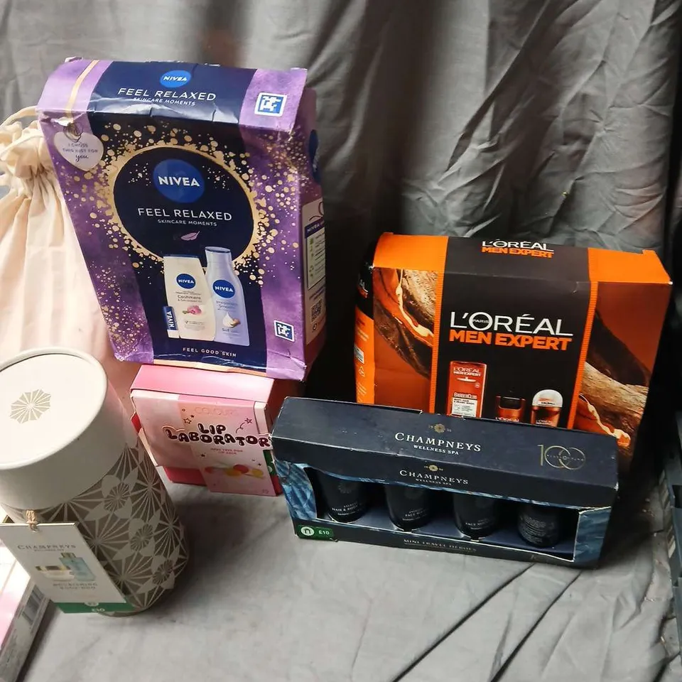 APPROXIMATEY 20 ASSORTED HEALTH AND BEAUTY PRODUCTS TO INCLUDE - NIVEA ,CHAMPNEYS AND TED BAKER .