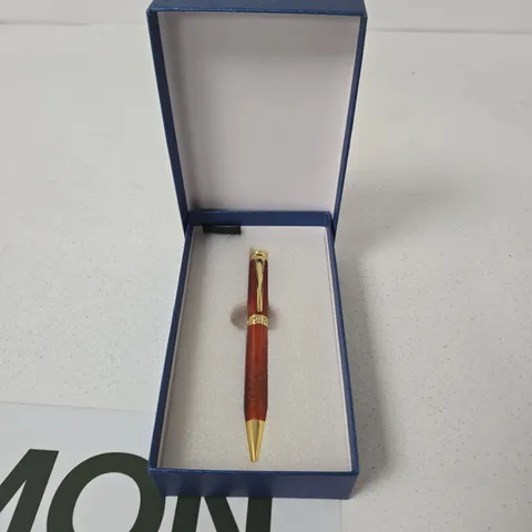BROWN RESIN BALLPOINT PEN WITH GOLD TONE TRIM IN BLUE PRESENTATION BOX
