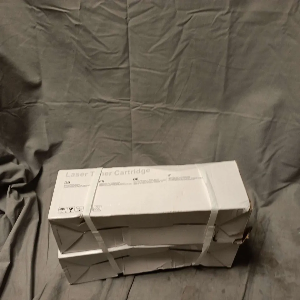 BOX OF APPROXIMATELY 18 ASSORTED ITEMS INCLUDING MOBILE GAMING CLIP AND LASER TONER CARTRIDGE 