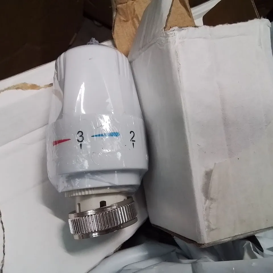 BOX CONTAINING LARGE AMOUNT OF RADIATOR THERMOSTATS 