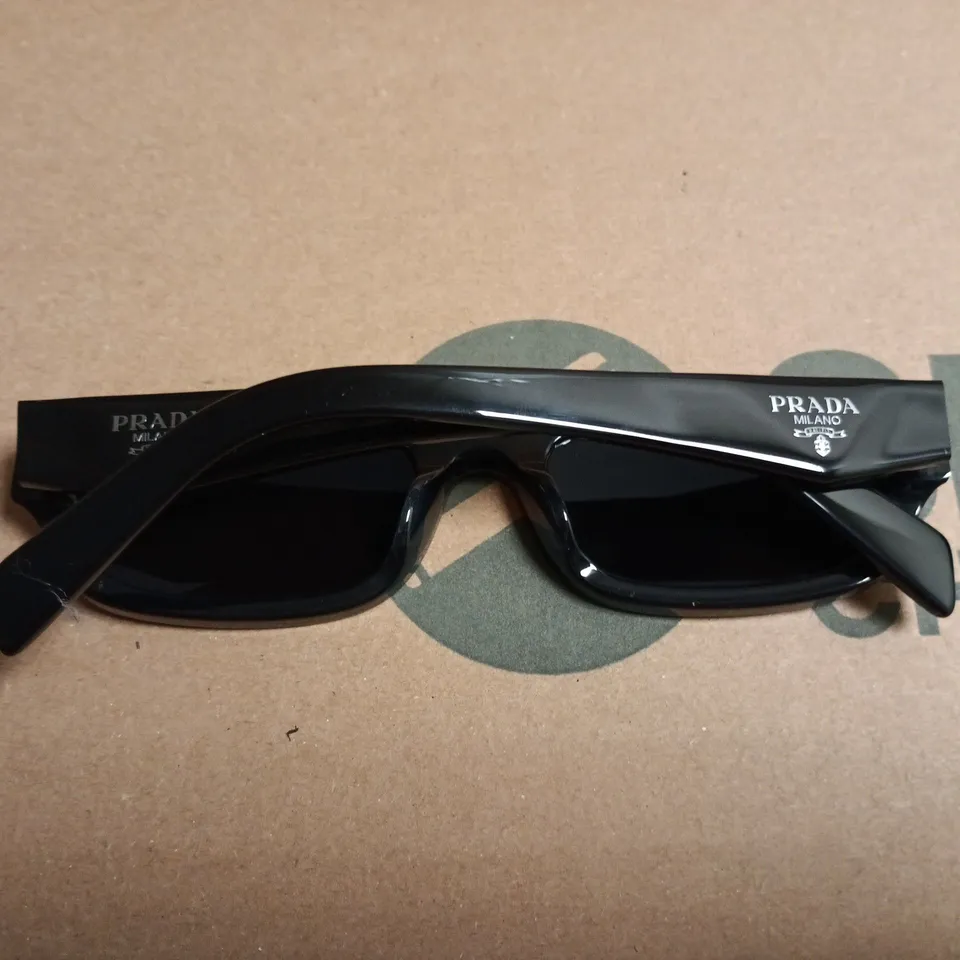 BOXED PAIR OF PRADA SUNGLASSES