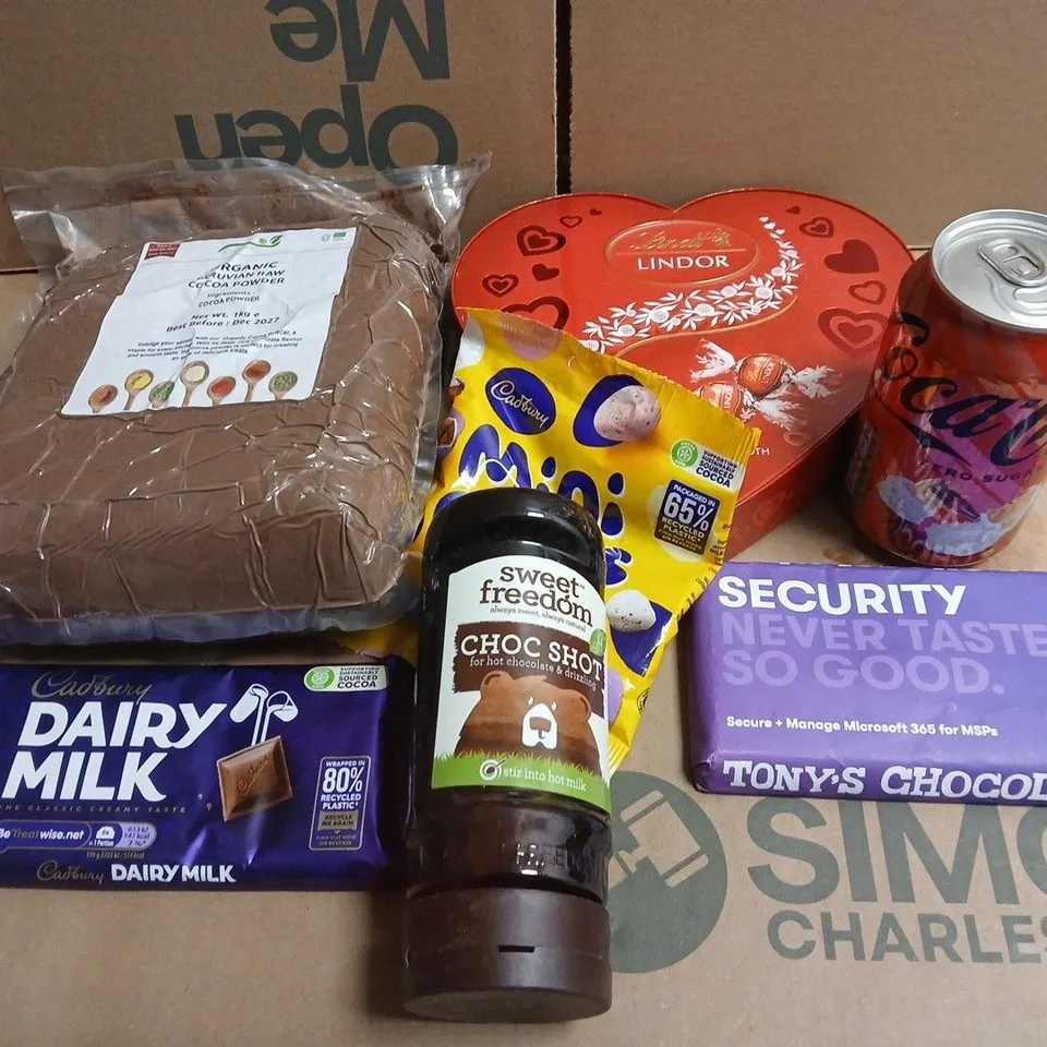 APPROXIMATELY 5 ASSORTED FOOD ITEMS TO INCLUDE MINI EGGS , COCACOLA AND CHOC SHOT 