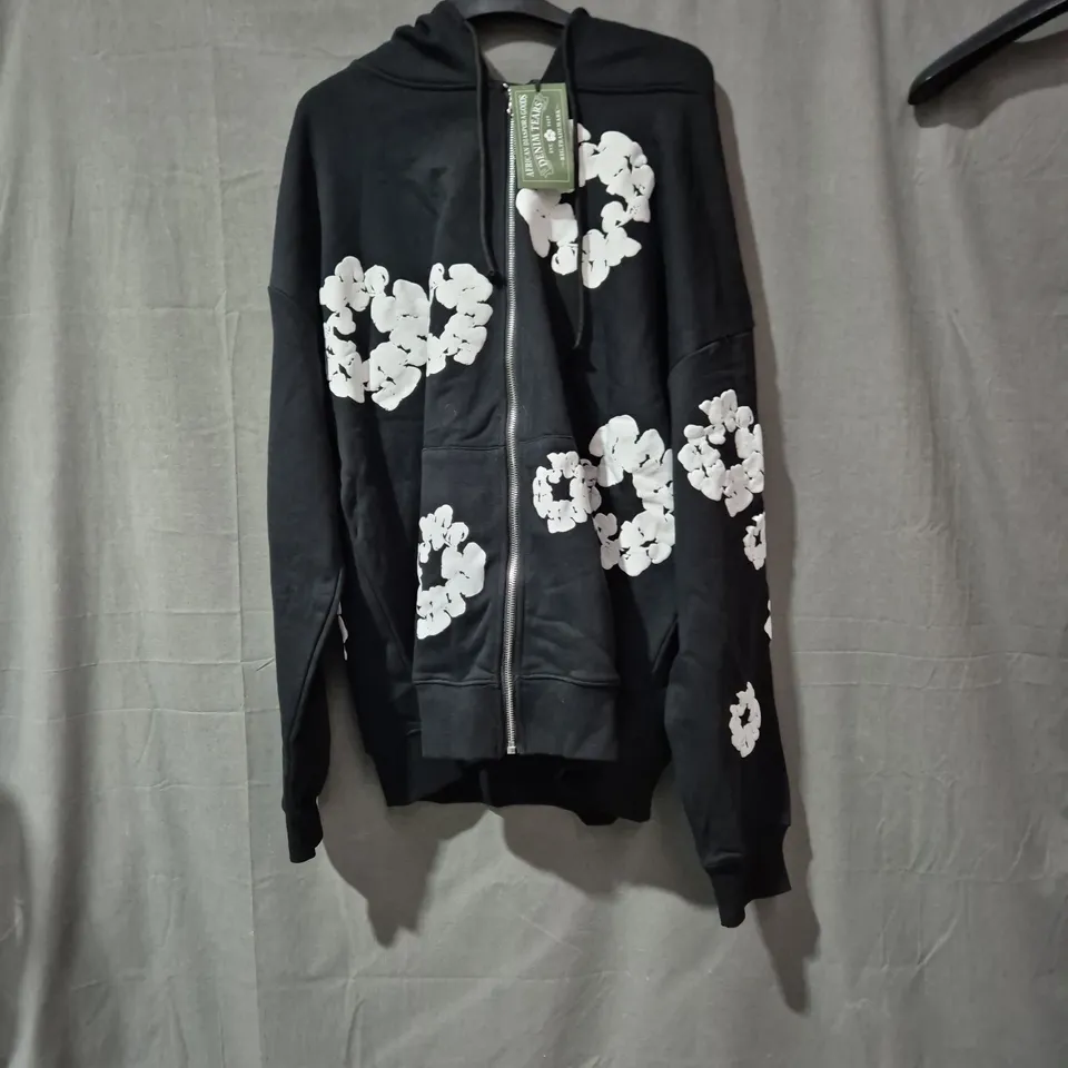 DENIM TEARS X AFRICAN DIASPORA GOODS HOODIE – BLACK ZIP HOODIE WITH WHITE FLORAL PRINT