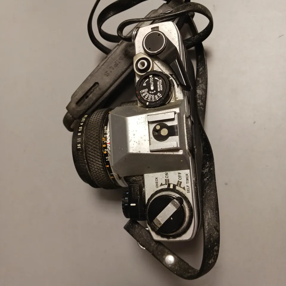 OLYMPUS FILM CAMERA OM 10 LEATHER STRAP INCLUDES MANUAL ADAPTOR