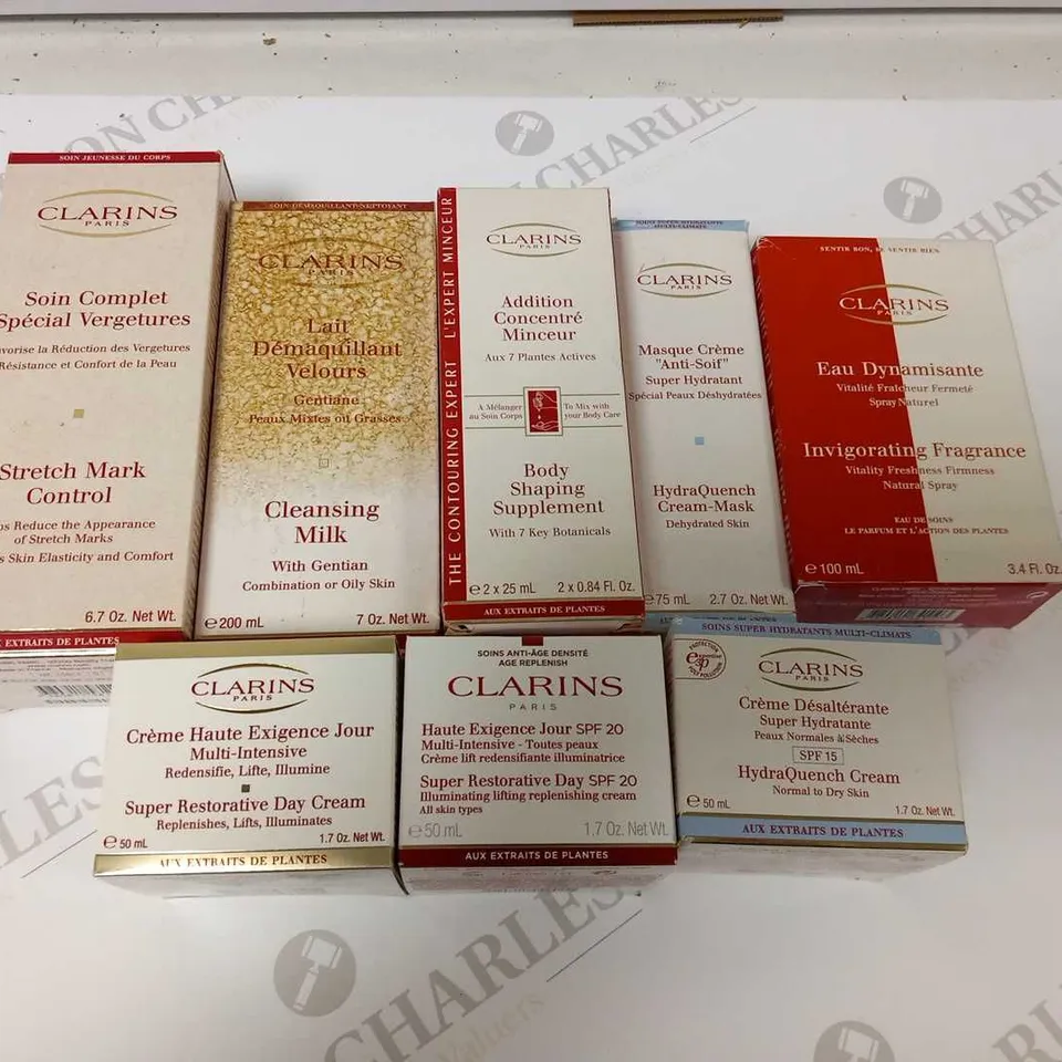 APPROXIMATELY 8 ASSORTED CLARINS PARIS PRODUCTS TO INCLUDE; STETCH MARK CONTROL, CLEANSING MILK, BODY SHAPING SUPPLEMENT, HYDRA QUENCH CREAM MASK, INVIGORATING FRAGRANCE, SUER RESTORATIVE DAY CREAM, A