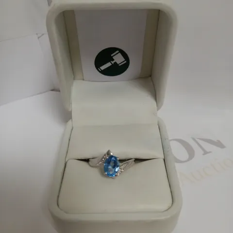 DESIGNER 9CT WHITE GOLD BLUE TOPAZ AND DIAMOND DRESS RING, +-1.35CT