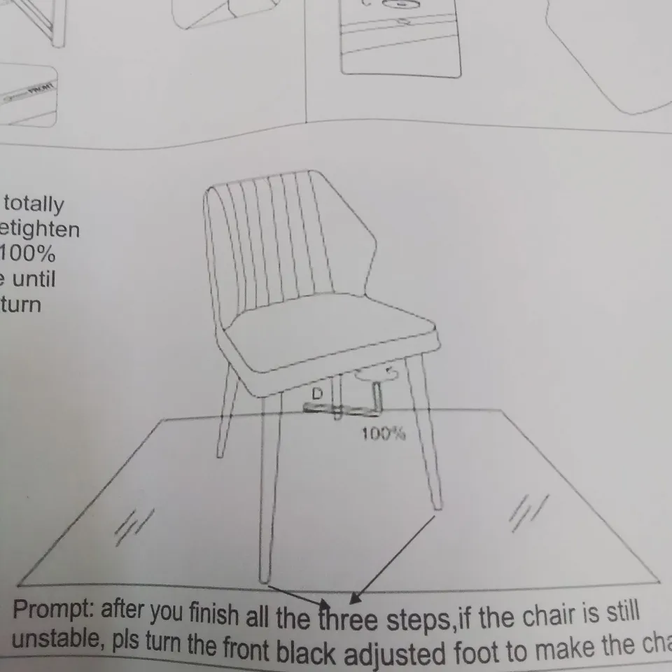 A BOXED PAIR OF GREY FAUX LEATHER UPHOLSTERED SIDE CHAIRS 