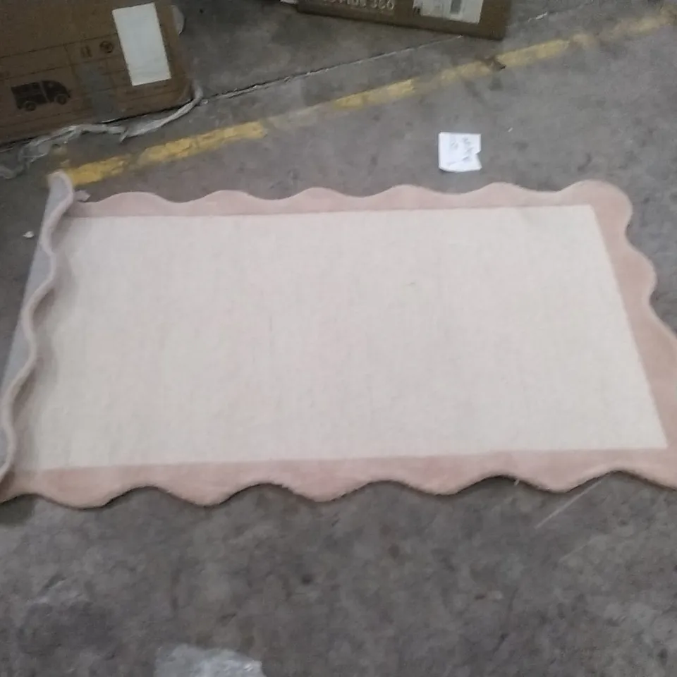 STILLAGE OF APPROXIMATELY 24 DESIGNER RUGS
