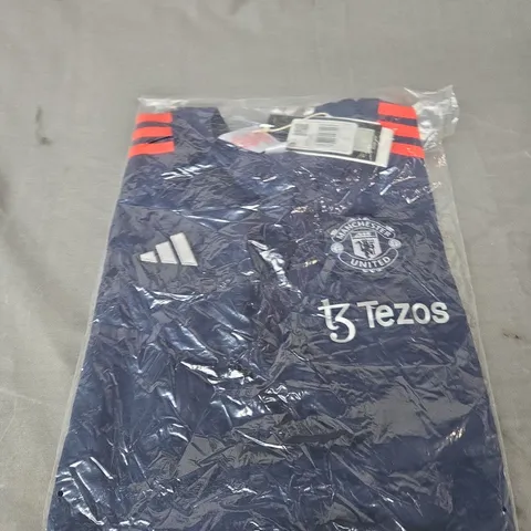 BAGGED MANCHESTER UNITED FC TRAINING TOP SIZE 11-12 YEARS - KIDS