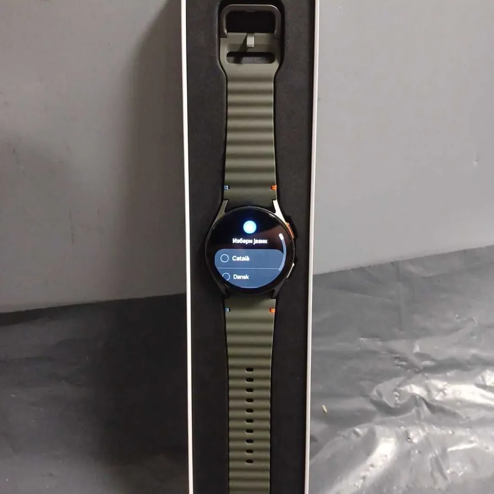 BOXED SAMSUNG GALAXY WATCH 7 IN BLACK WITH KHAKI STRAP