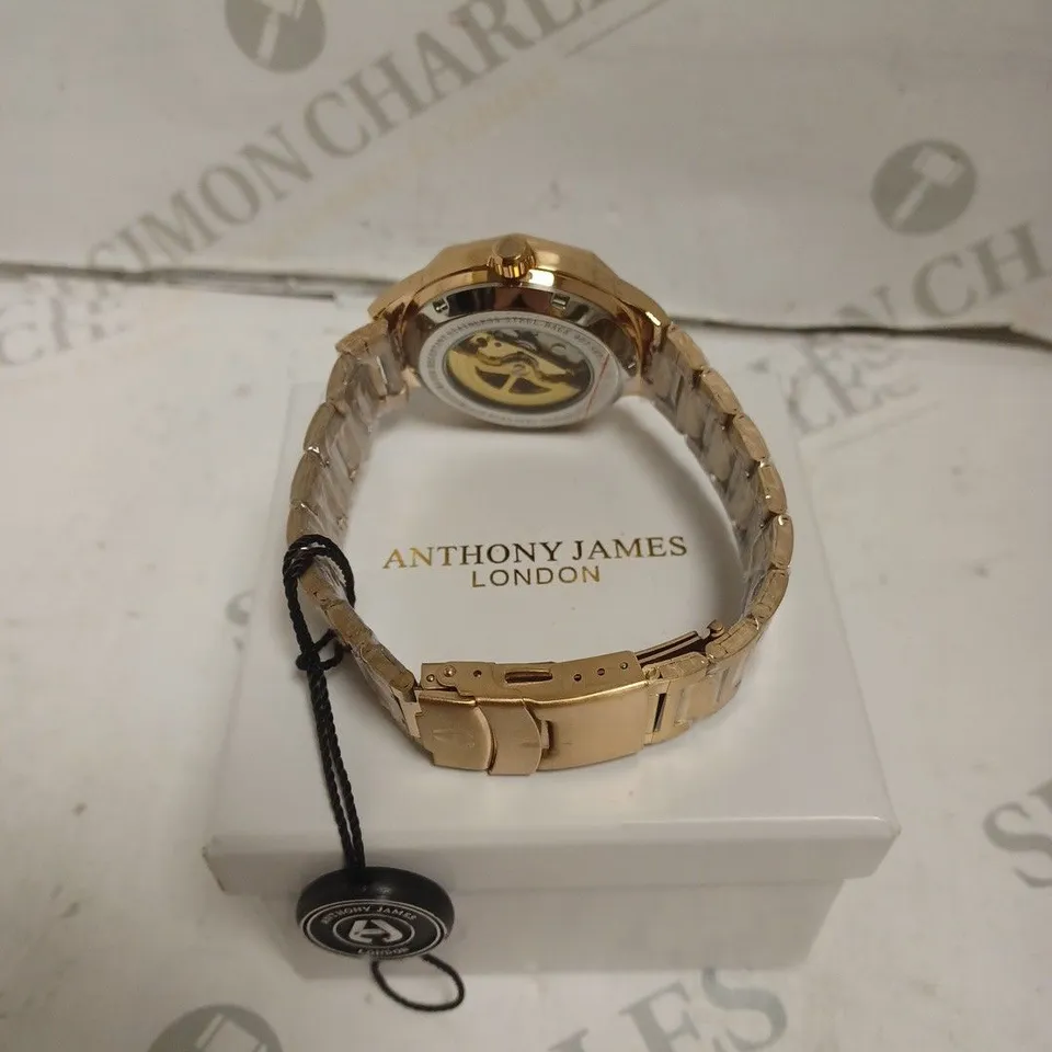 BOXED ANTHONY JAMES GENTS SPORTS SKELETON WATCH WITH STAINLESS STEEL BRACELET. 