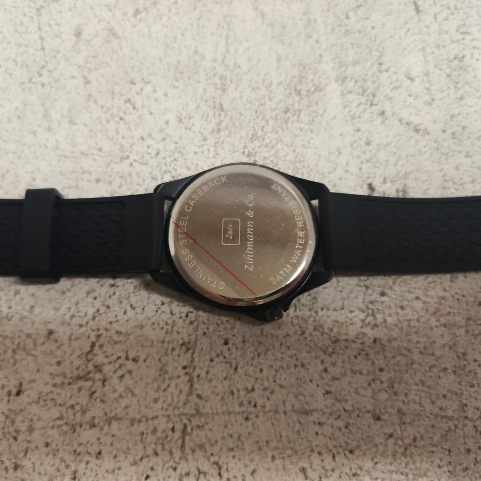 ZIHLMANN & CO. WRISTWATCH, BOXED – BLACK DIAL WITH RED NUMERALS