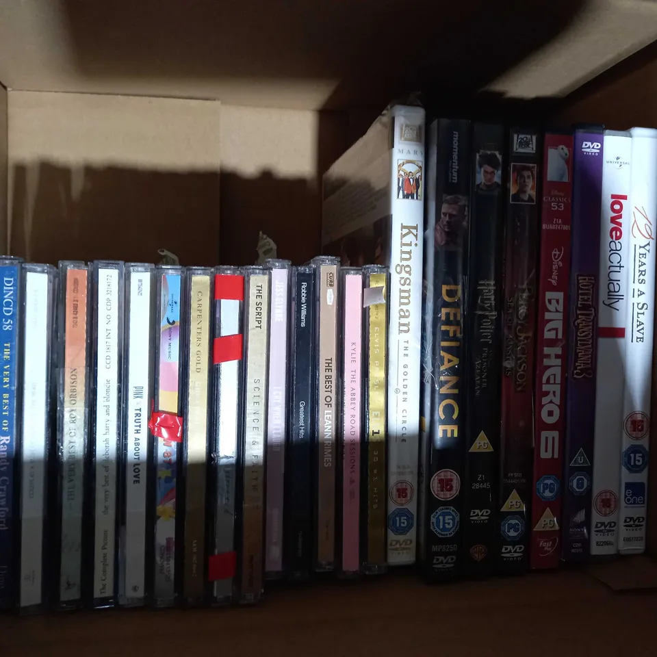 BOX OF APPROXIMATELY 20 ASSORTED CDS AND DVDS TO INCLUDE ROBBIE WILLIAMS GREATEST HITS, EMINEM RELAPSE, PARAMORE BRAND NEW EYES, ETC