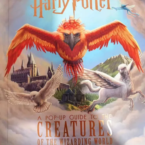 APPROXIMATELY 50 FROM THE FILMS OF HARRY POTTER A POP-UP GUIDE TO THE CREATURES OF THE WIZARDING WORLD