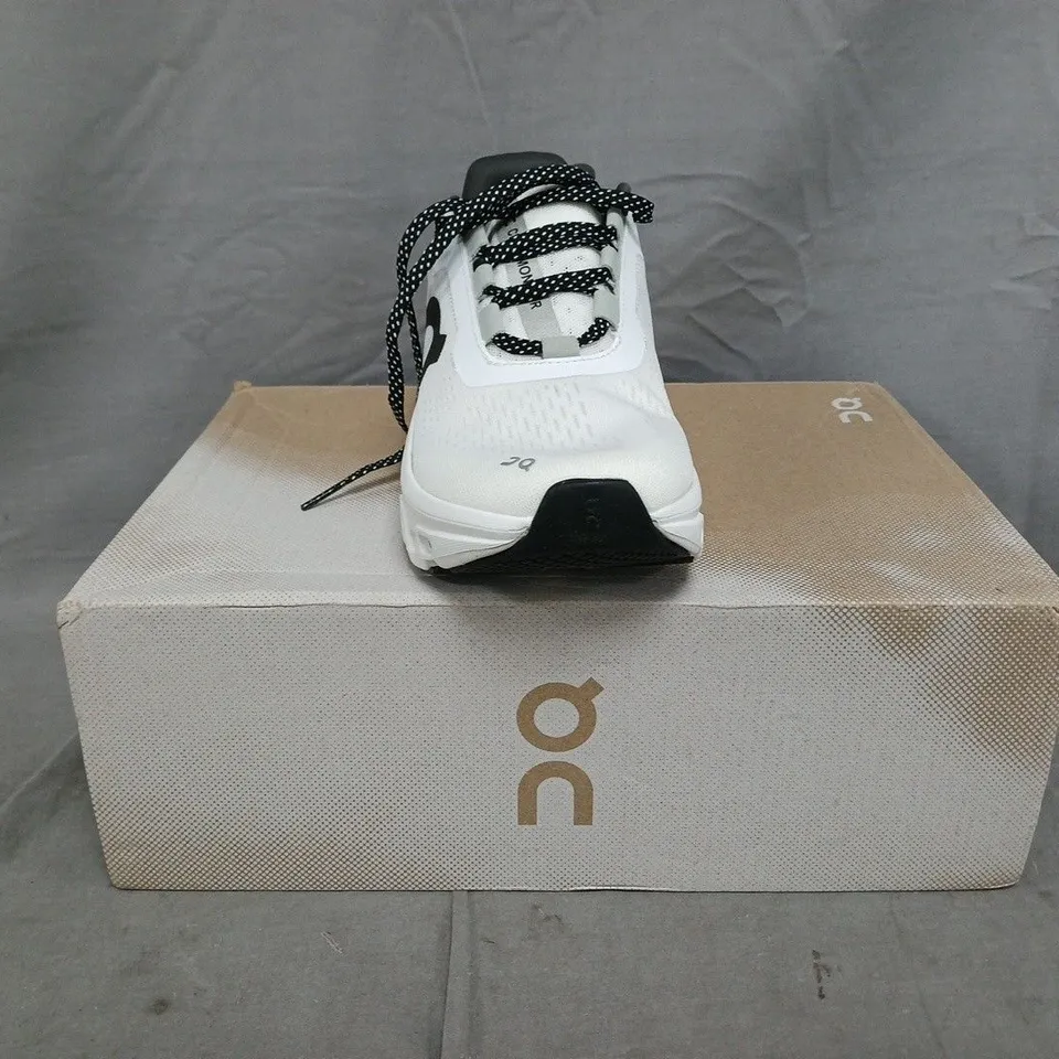 BOXED PAIR OF ON CLOUDMONSTER SHOES IN WHITE SIZE UK 4