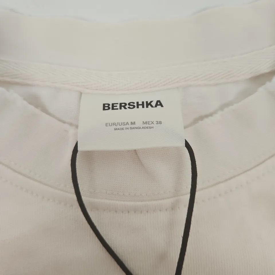 BERSHKA WHITE T‑SHIRT – SIZE M (EU 38) – MADE IN BANGLADESH