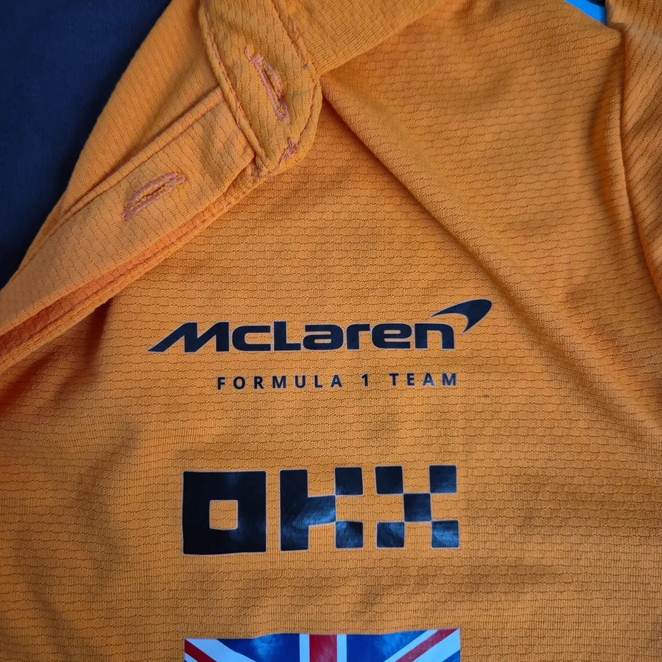 CASTORE MCLAREN FORMULA 1 TEAM POLO SHIRT – ORANGE, UK M (4 NORRIS)