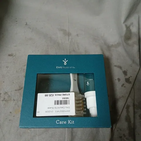 BOX OF APPROXIMATELY 15 ASSORTED ITEMS INCLUDING EMU CARE KIT , FAUX FUR DRAUGHT EXCLUDER AND EPSON TAPE CARTRIDGE 