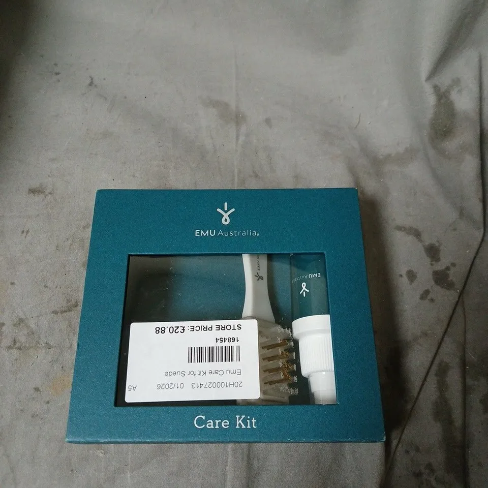 BOX OF APPROXIMATELY 15 ASSORTED ITEMS INCLUDING EMU CARE KIT , FAUX FUR DRAUGHT EXCLUDER AND EPSON TAPE CARTRIDGE 