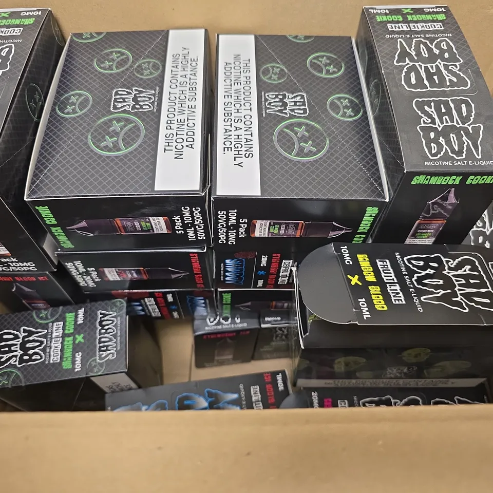 BOX OF APPROXIMATELY 15 ASSORTED SAD BOY E-LIQUID PRODUCTS TO INCLUDE - FRUIT LINE RAINBOW BLOOD , ICE FRUIT LINE STRAWBERRY BLOOD ICE , COOKIE LINE SHAMROCK COOKIE