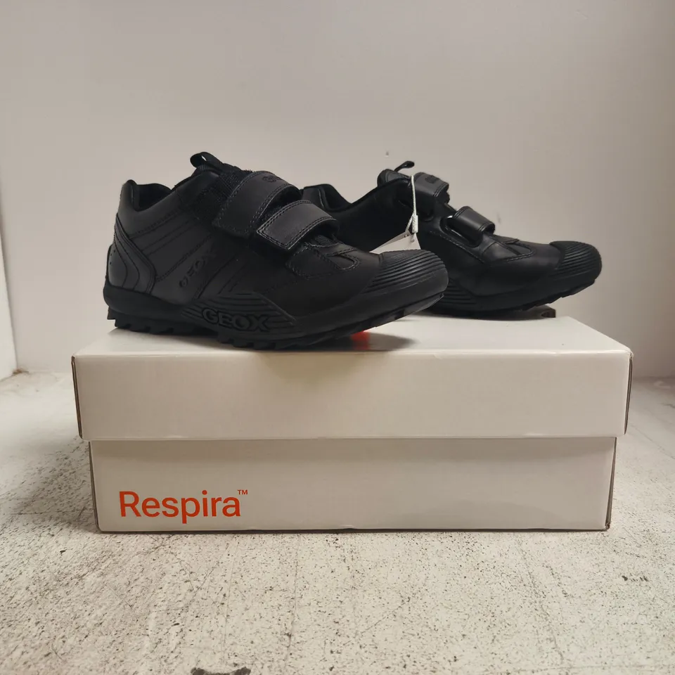 BOXED PAIR OF GEOX VELCRO STRAP TRAINERS IN BLACK SIZE 2.5