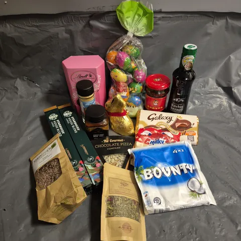 APPROXIMATELY 15 ASSORTED FOOD AND DRINK PRODUCTS TO INCLUDE - LINDT STRAWBERRIES & CREAM - EGMONT MANUKA HONEY 100+ - STARBUCK NESPRESSO PODS - ETC