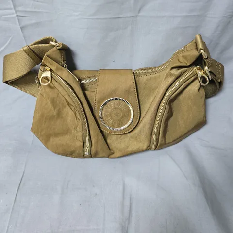 KIPLING TAN NYLON BAG WITH CIRCULAR METAL BADGE